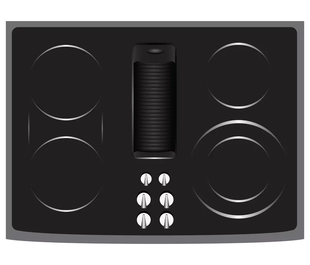a black stove top with downdraft ventilation